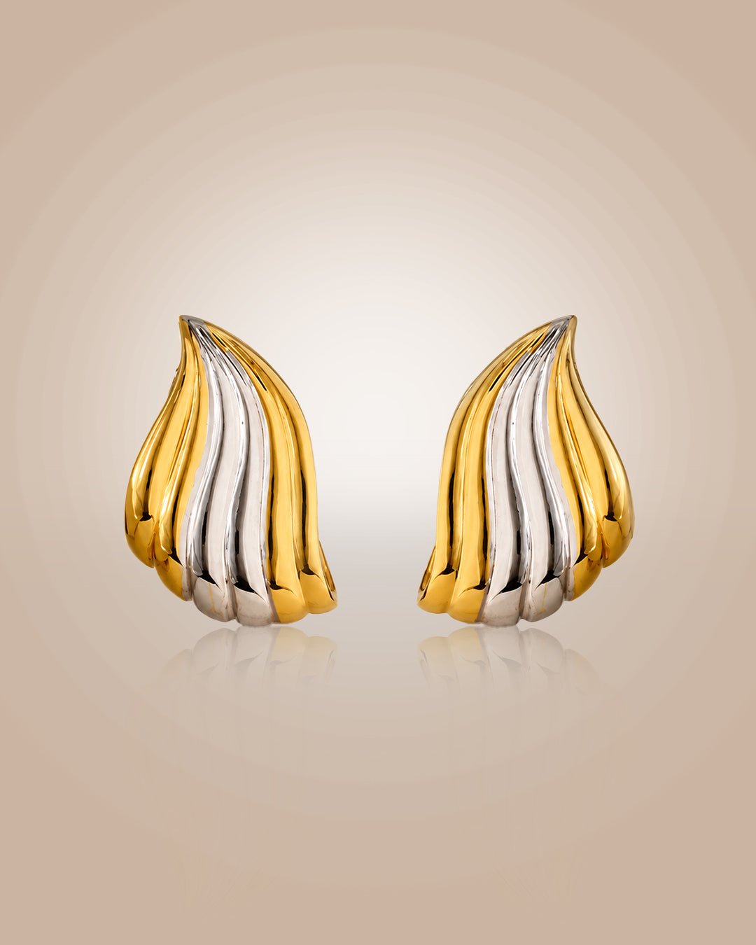 Dual-tone 925 silver 22K gold vermeil & rhodium wave earcuffs; anti-tarnish, perfect for daily wear on beige background.
