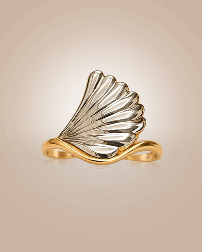 925 silver 22K gold vermeil & rhodium adjustable wave ring with CZ; anti-tarnish, daily wear on warm beige background.