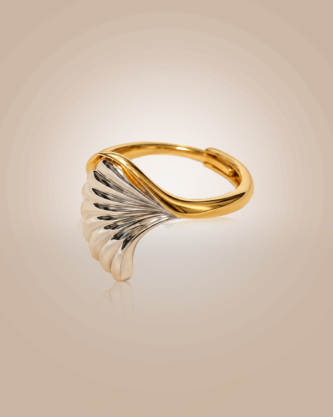 925 silver 22K gold vermeil & rhodium adjustable wave ring with CZ; anti-tarnish, daily wear on warm beige background.