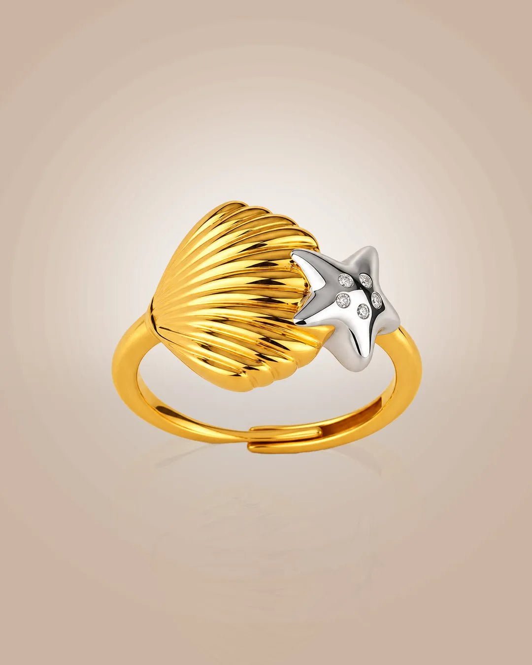 925 silver 22K gold vermeil & rhodium Samudra Tara ring; starfish & shell motif with CZ, anti-tarnish, daily look on beige.