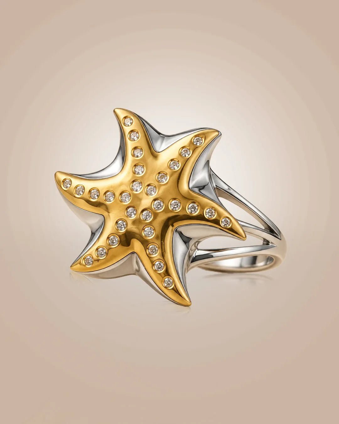925 silver 22K gold vermeil & rhodium Samudra Tara ring; starfish motif with CZ, anti-tarnish, statement look on beige.