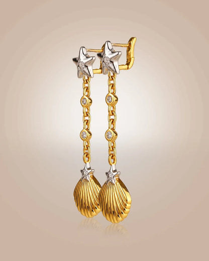 925 silver 22K gold vermeil & rhodium drop earrings; starfish & seashell motifs with CZ, anti-tarnish on beige.